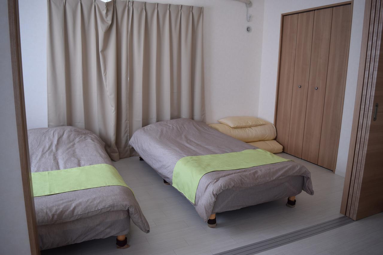 Rainbow Terrace Ginowan Apartamento Exterior foto