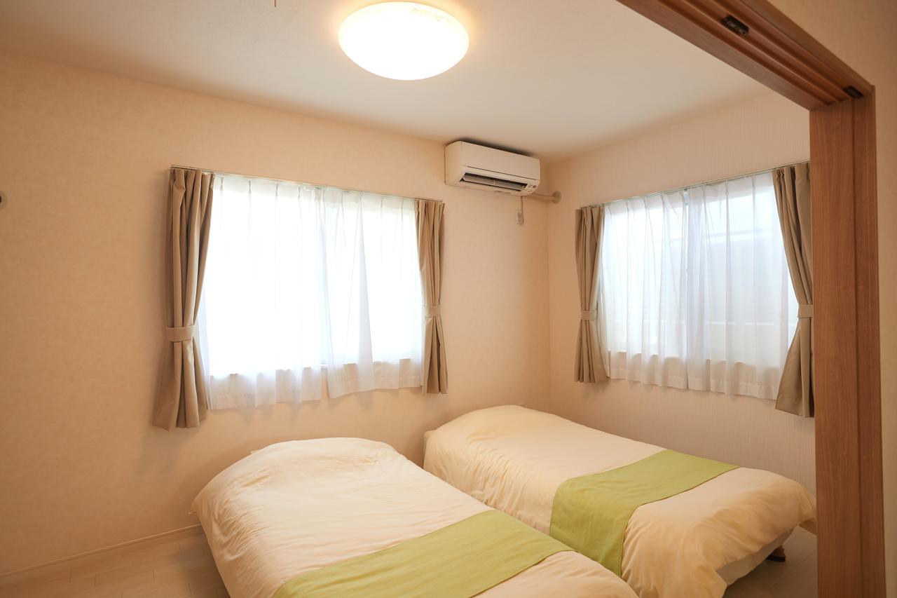 Rainbow Terrace Ginowan Apartamento Exterior foto